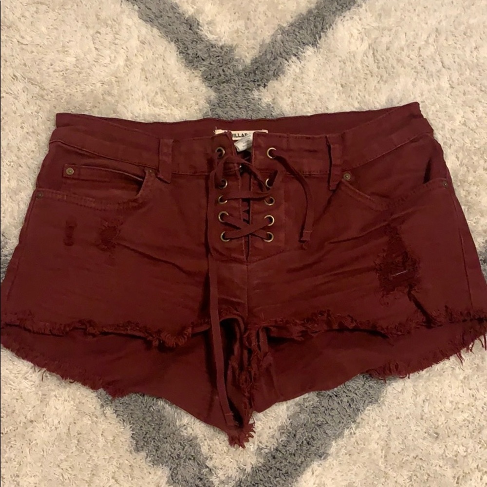 Billabong distressed maroon denim shorts size 25
